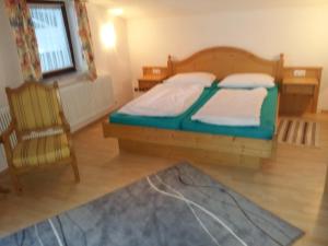Postel nebo postele na pokoji v ubytování Haus Kropf