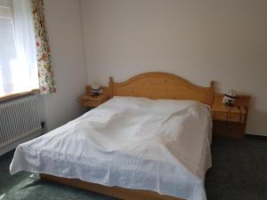 Postel nebo postele na pokoji v ubytování Haus Kropf