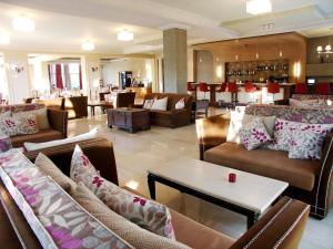 A seating area at Aphrodite Hotel