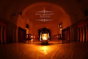 a lantern sitting on the floor of a hall at Hotel Serendib Hill in Bandarawela