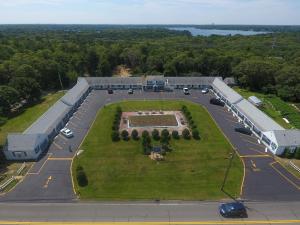 an aerial view of a parking lot with a park at Knights Inn Centerville Cape Cod Area in Centerville