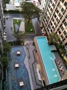 an overhead view of a swimming pool in a city at LLX Apartments at The Base condo in Pattaya Central