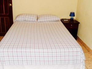 Postelja oz. postelje v sobi nastanitve Hotel & Hostal Yaxkin Copan