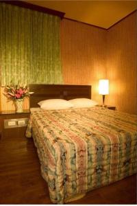 Postel nebo postele na pokoji v ubytování Hotel Lee-Chan