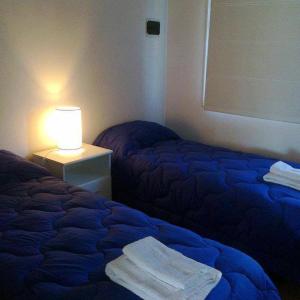 Una cama o camas en una habitación de Alojamiento H346