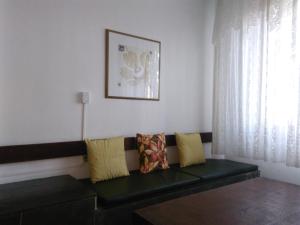 Un lugar para sentarse en Apartamento no Guarujá - Praia das Pitangueiras