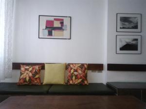 Un lugar para sentarse en Apartamento no Guarujá - Praia das Pitangueiras