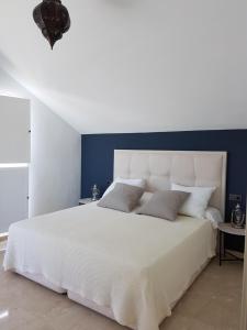 Apartment Duplex Las Arenasにあるベッド