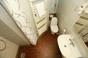 Koupelna v ubytování Hotel 9 små hjem