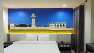 Cama o camas de una habitación en Lotus Yuan Business Hotel