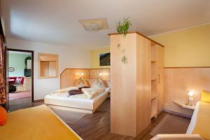 Ένα ή περισσότερα κρεβάτια σε δωμάτιο στο Ferienhaus Sonnenhang