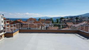 a balcony with a view of a city at Vila Andrra in Struga +26 photos