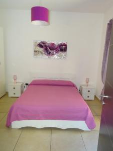 Postel nebo postele na pokoji v ubytování B&B Soleluna