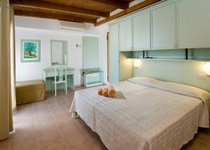 Postel nebo postele na pokoji v ubytování Hotel Pacific
