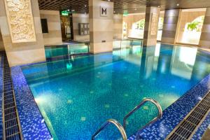 Bazén v ubytování Moty Hotel nebo v jeho okolí