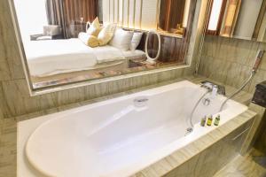 Koupelna v ubytování Moty Hotel