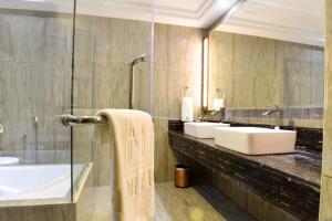 Koupelna v ubytování Moty Hotel