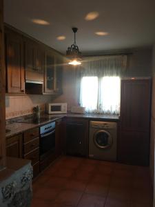 A kitchen or kitchenette at La Chaparra Még 6 kép