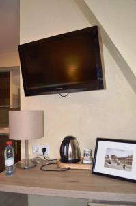 TV/Unterhaltungsangebot in der Unterkunft Hotel-Restaurant Dimmer