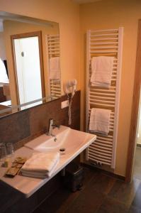 Ein Badezimmer in der Unterkunft Hotel-Restaurant Dimmer