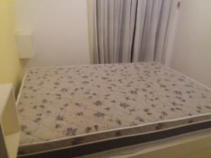 Postel nebo postele na pokoji v ubytování Residencial Mailai