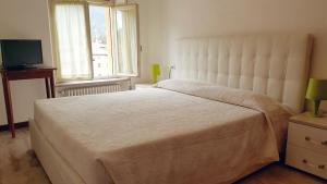 Postel nebo postele na pokoji v ubytování Paradiso
