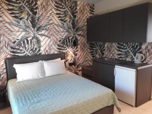 Кровать или кровати в номере 4 Seasons Luxury Apartments