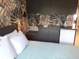 Кровать или кровати в номере 4 Seasons Luxury Apartments