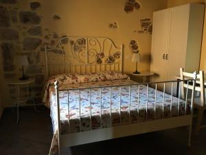 Letto o letti in una camera di Alloggio del Grand Tour
