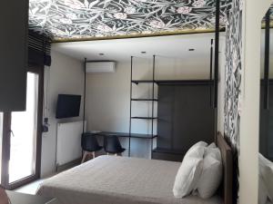 Кровать или кровати в номере 4 Seasons Luxury Apartments