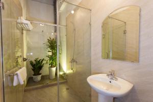 Koupelna v ubytování Luxury Backpakers Hotel
