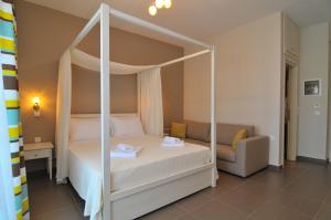 Ntinas Filoxenia Hotel & Spa客房内的一张或多张床位