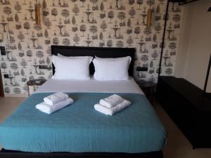 Кровать или кровати в номере 4 Seasons Luxury Apartments