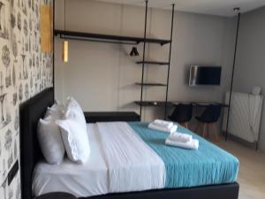 Кровать или кровати в номере 4 Seasons Luxury Apartments