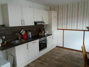 Kuchyň nebo kuchyňský kout v ubytování Ferienhaus Bernhardine