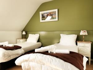 Cama o camas de una habitación en Hotel Apartments Belgium II