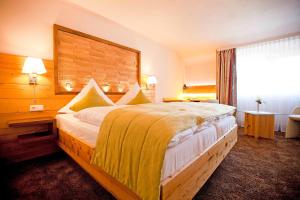 Postel nebo postele na pokoji v ubytování Hotel Restaurant Waldsägmühle