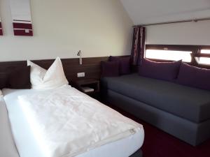 Postel nebo postele na pokoji v ubytování Pension am Weinberg Bed & Breakfast