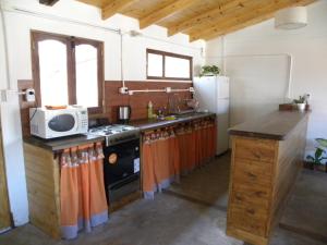 Una cocina o kitchenette en Descanso de las Piedras