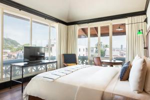 Postel nebo postele na pokoji v ubytování American Trade Hotel