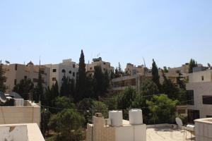 Afbeelding uit fotogalerij van The Place Apartments in Amman