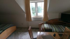 Postel nebo postele na pokoji v ubytování ApartmányDanielova