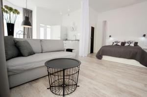 Łóżko lub łóżka w pokoju w obiekcie Apartament Towarowa Kolobrzeg