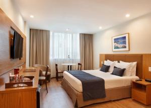 Voodi või voodid majutusasutuse Windsor Excelsior Copacabana toas
