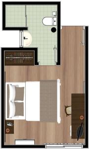 a floor plan of a bedroom with a bed at Hotel Itajara in Jaraguá do Sul