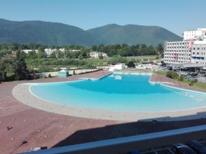 a large swimming pool on top of a building at Sarajevo Apartment Ilidza in Sarajevo