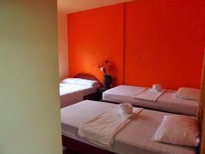 Postel nebo postele na pokoji v ubytování Cabinas El Muellecito