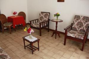 A seating area at Gem Holiday Beach Resort