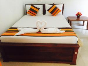 Postel nebo postele na pokoji v ubytování Disna Homestay