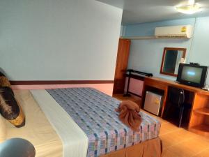 Rúm í herbergi á Phi Phi Coralbay